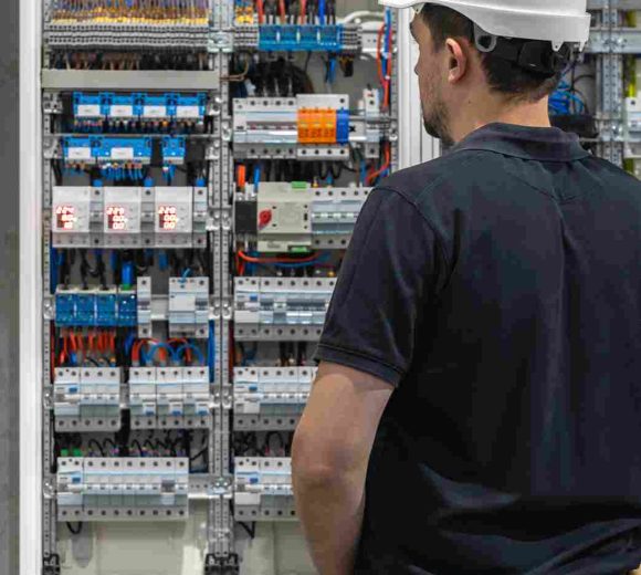 man-an-electrical-technician-working-in-a-switchb-2026-01-08-23-42-41-utc_11zon