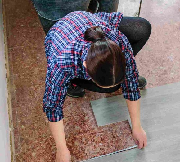 unrecognizable-female-bricklayer-measuring-tiles-t-2026-01-09-00-00-06-utc_11zon